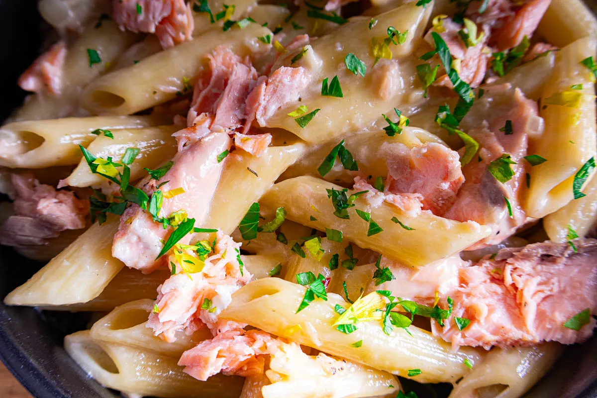 Creamy pasta alla Salmone pasta topped with fresh parsley.