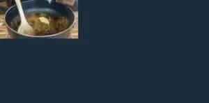 Cooking vermicelli in a pan with a wooden spoon and garlic paste, ideal for savory recipes.