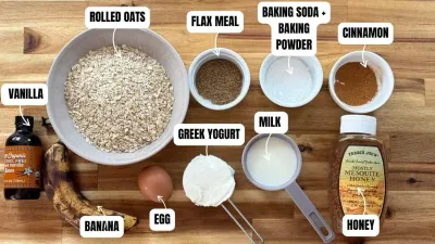 Banana Oatmeal Pancakes ingredients: rolled oats, egg, milk, honey, cinnamon, yogurt, flax meal, vanilla, baking soda, banana.